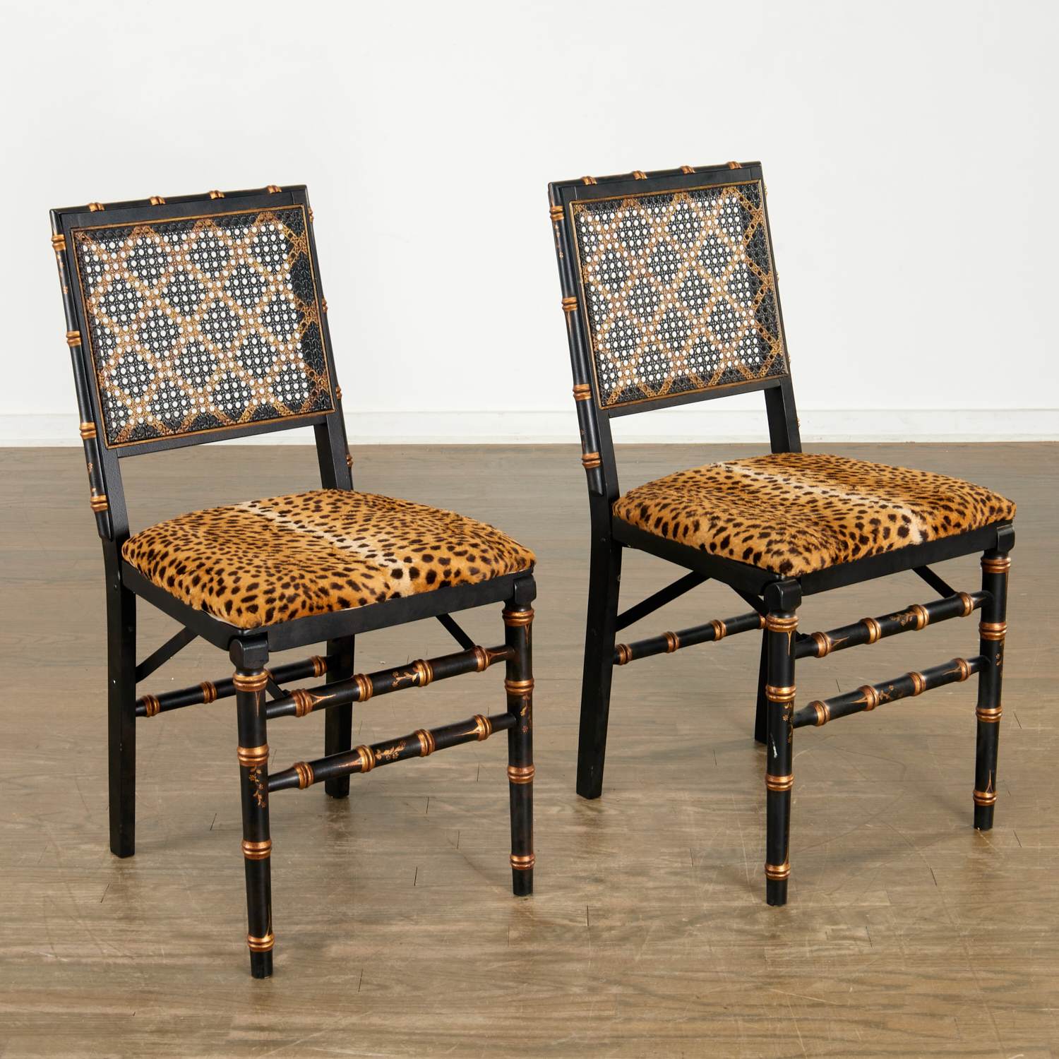 PAIR GILT & EBONIZED LEOPARD