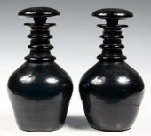 PAIR GREEN GLASS DECANTERS-wit
