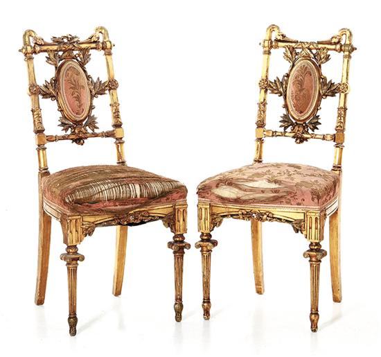 Pair Herter Brothers carved