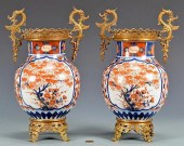 PAIR IMARI URNS WITH GILT MOUN