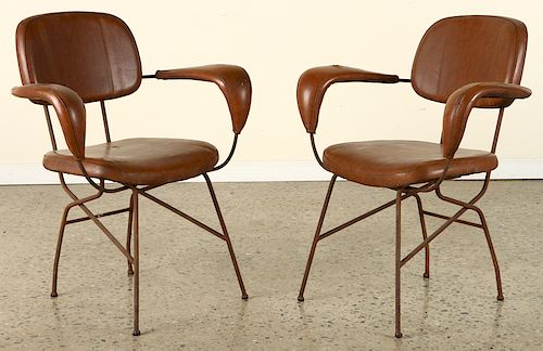 PAIR ITALIAN NAUGAHYDE IRON