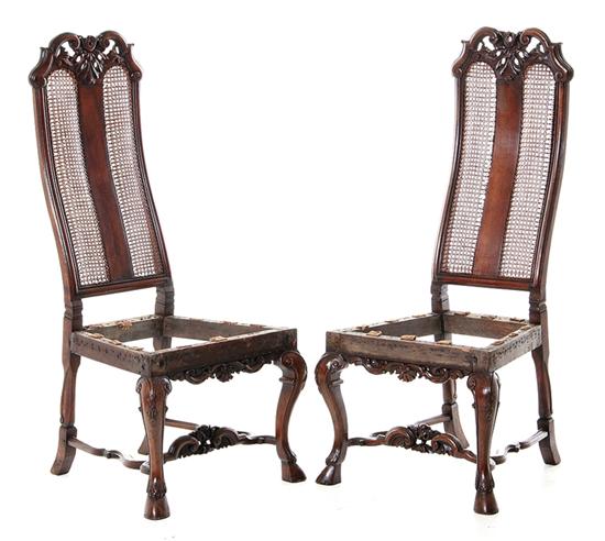 Pair James II style carved walnut