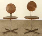 PAIR LEATHER UPHOLSTERED SWIVE
