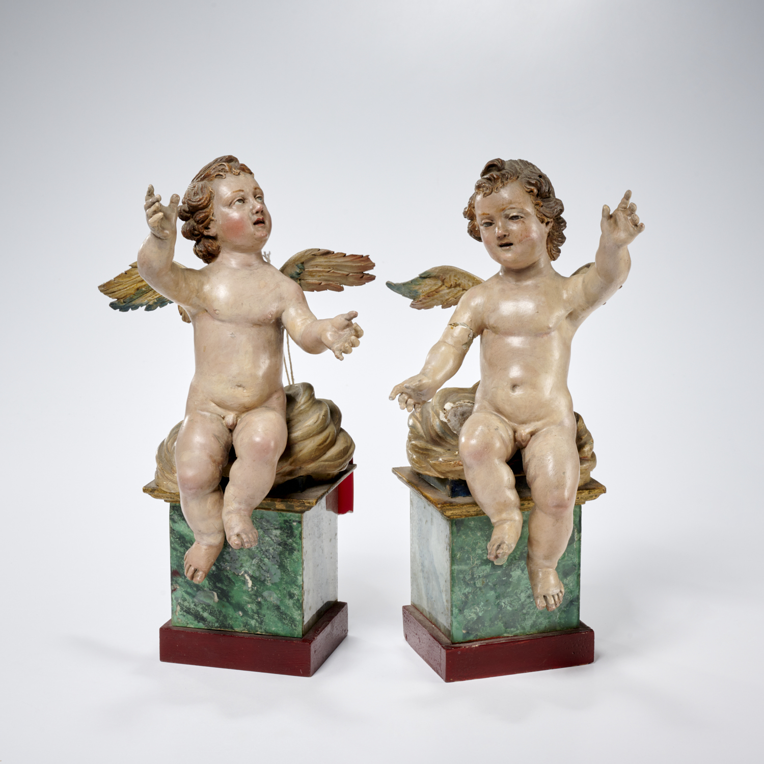 PAIR NEAPOLITAN MODELS OF SEATED