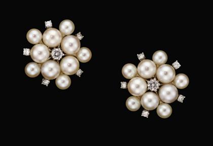 Pair of 14 karat white gold,