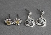 PAIR OF 14-KARAT WHITE-GOLD AN
