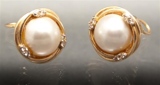 Pair of 14K yellow gold, diamond