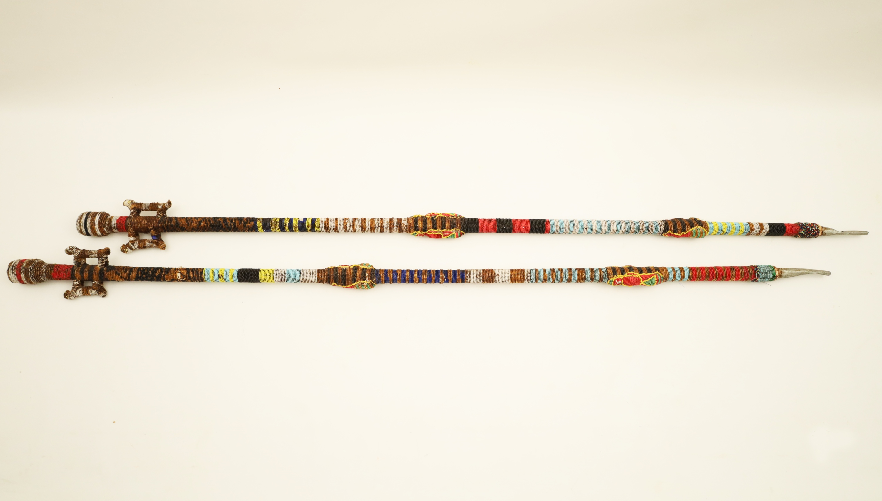 PAIR OF AFRICAN BEADED STAFFS Old