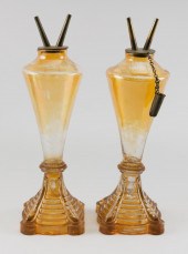 PAIR OF AMBER SANDWICH GLASS L