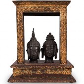 PAIR OF ANTIQUE BUDDHA HEADS I
