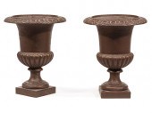 PAIR OF ANTIQUE CAST IRON CAMP