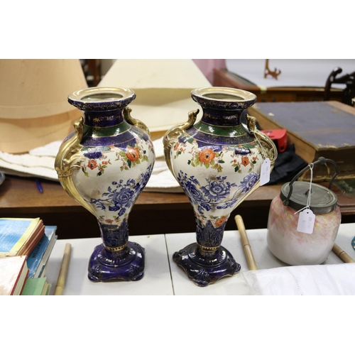 Pair of antique twin handle