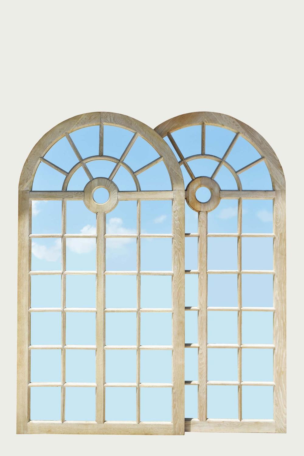 PAIR OF ARCHED WOOD MIRRORSEach