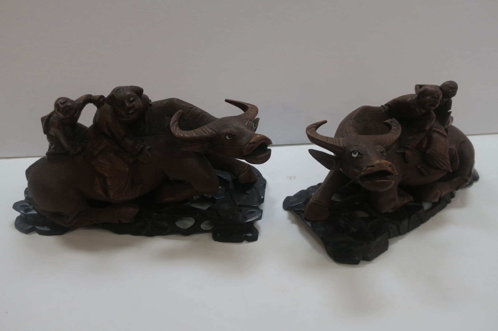 PAIR OF ASIAN HAND CARVED WATER