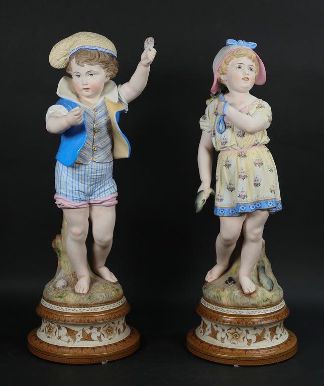 PAIR OF BISQUE PORCELAIN FIGURES