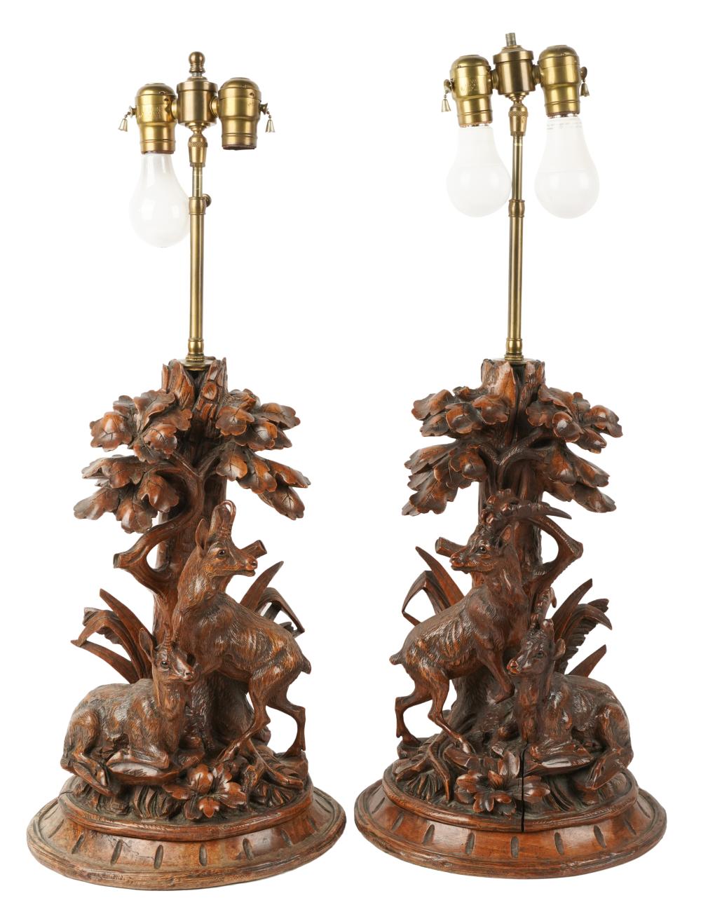 PAIR OF BLACK FOREST-STYLE CARVED