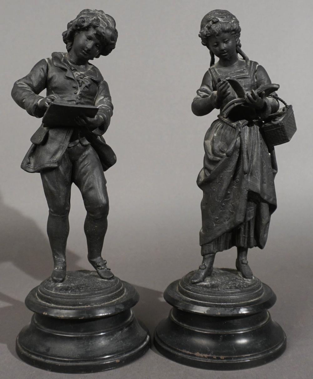 PAIR OF BLACK PAINTED METAL FIGURES