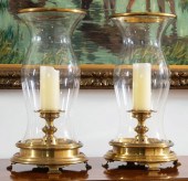 PAIR OF BRASS AND GLASS HURRIC
