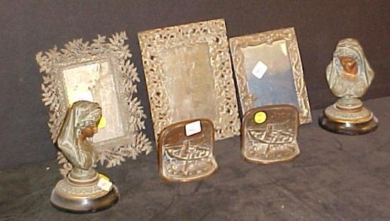 Pair of brass bookends of man in