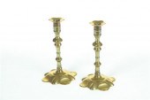 PAIR OF BRASS CANDLESTICKS.  E