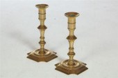 PAIR OF BRASS CANDLESTICKS.  E