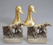 PAIR OF BRASS DUCK-FORM BOOKEN