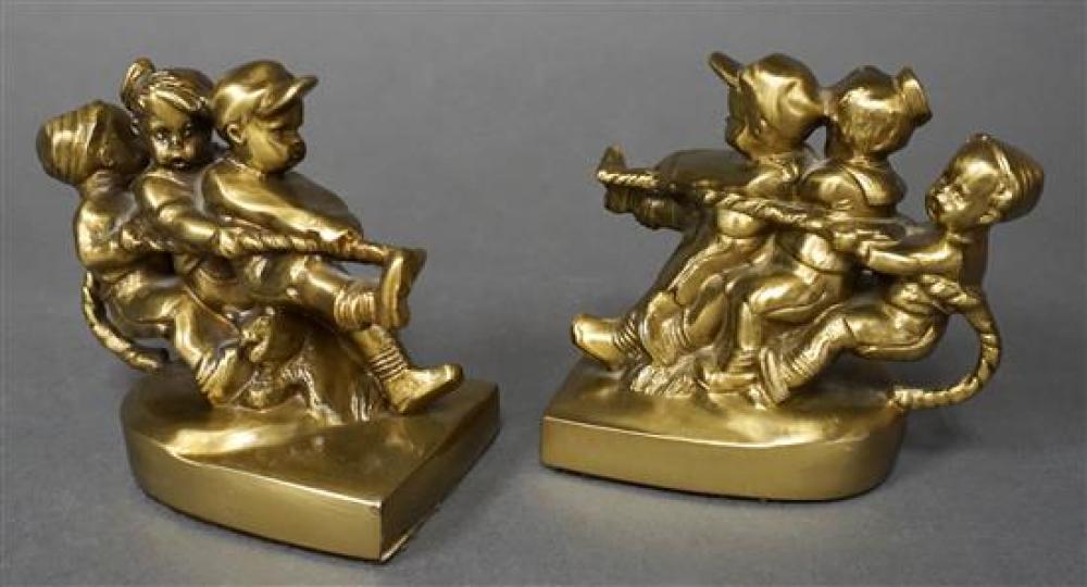 PAIR OF BRASS TONE METAL 'TUG OF