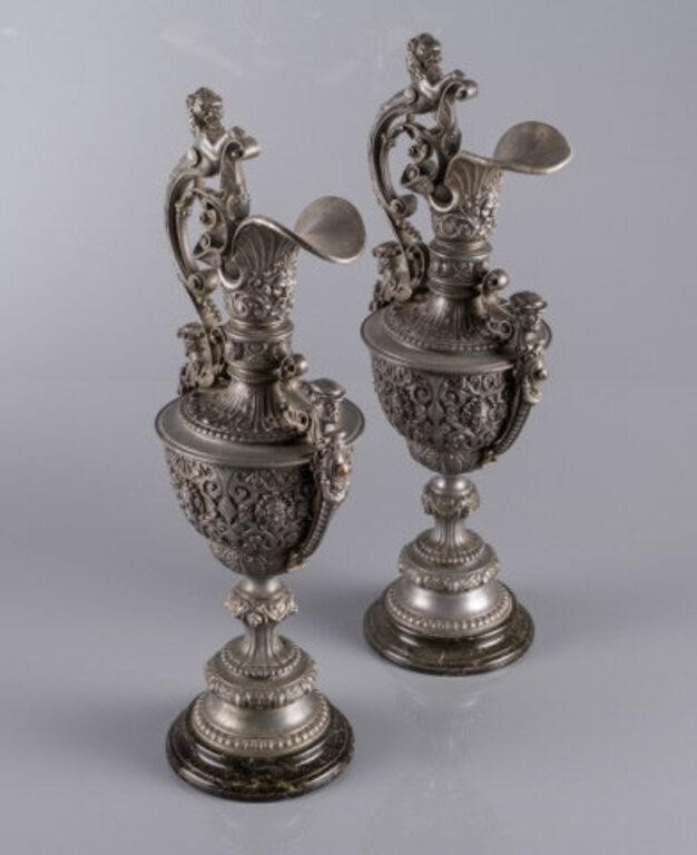 PAIR OF BRITISH SPELTER EWERSA pair