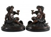 PAIR OF BRONZE CHERUB FIGURESe