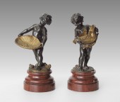 PAIR OF BRONZE CHERUBIC FIGURE