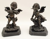 PAIR OF BRONZE CHERUBS SIGNED