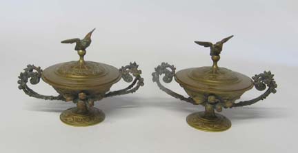 Pair of bronze covered urns    late
