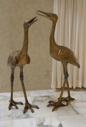 PAIR OF BRONZE EGRET STATUESPa