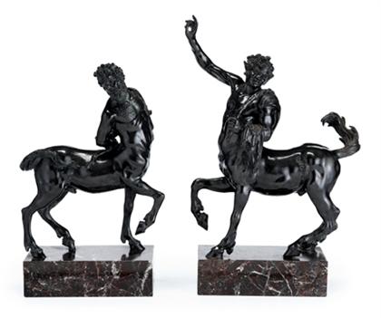 Pair of bronze figures after