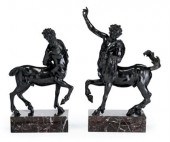 Pair of bronze figures after F