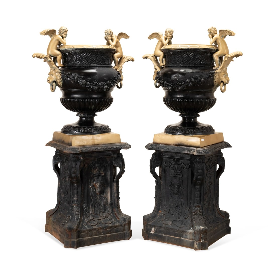 PAIR OF BRONZE GARDEN URNS ON