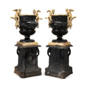 PAIR OF BRONZE GARDEN URNS ON