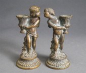 PAIR OF BRONZE PUTTI FIGURAL C