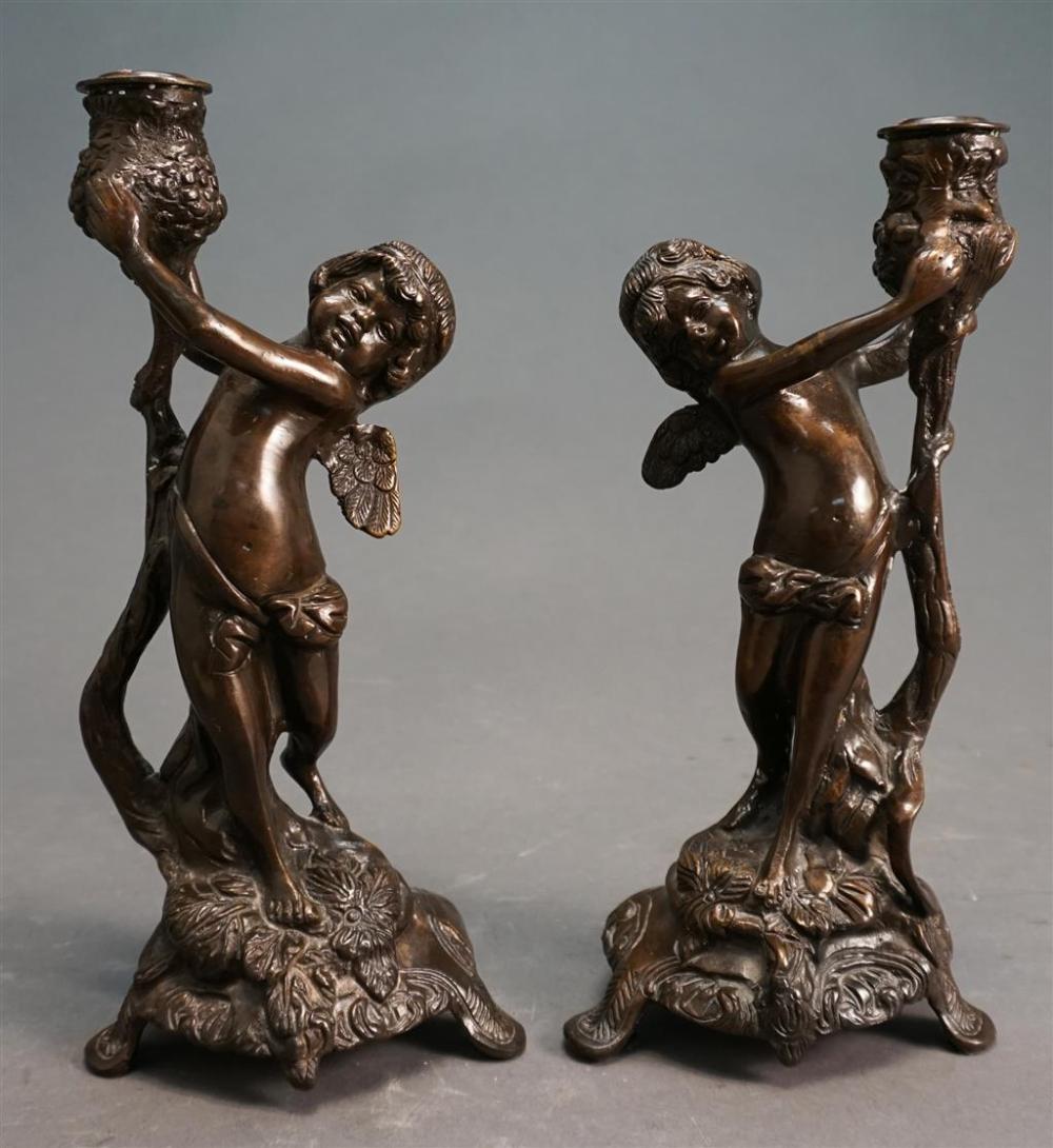 PAIR OF BRONZE PUTTI FORM
