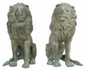 PAIR OF BRONZE-SEATED LIONSPai