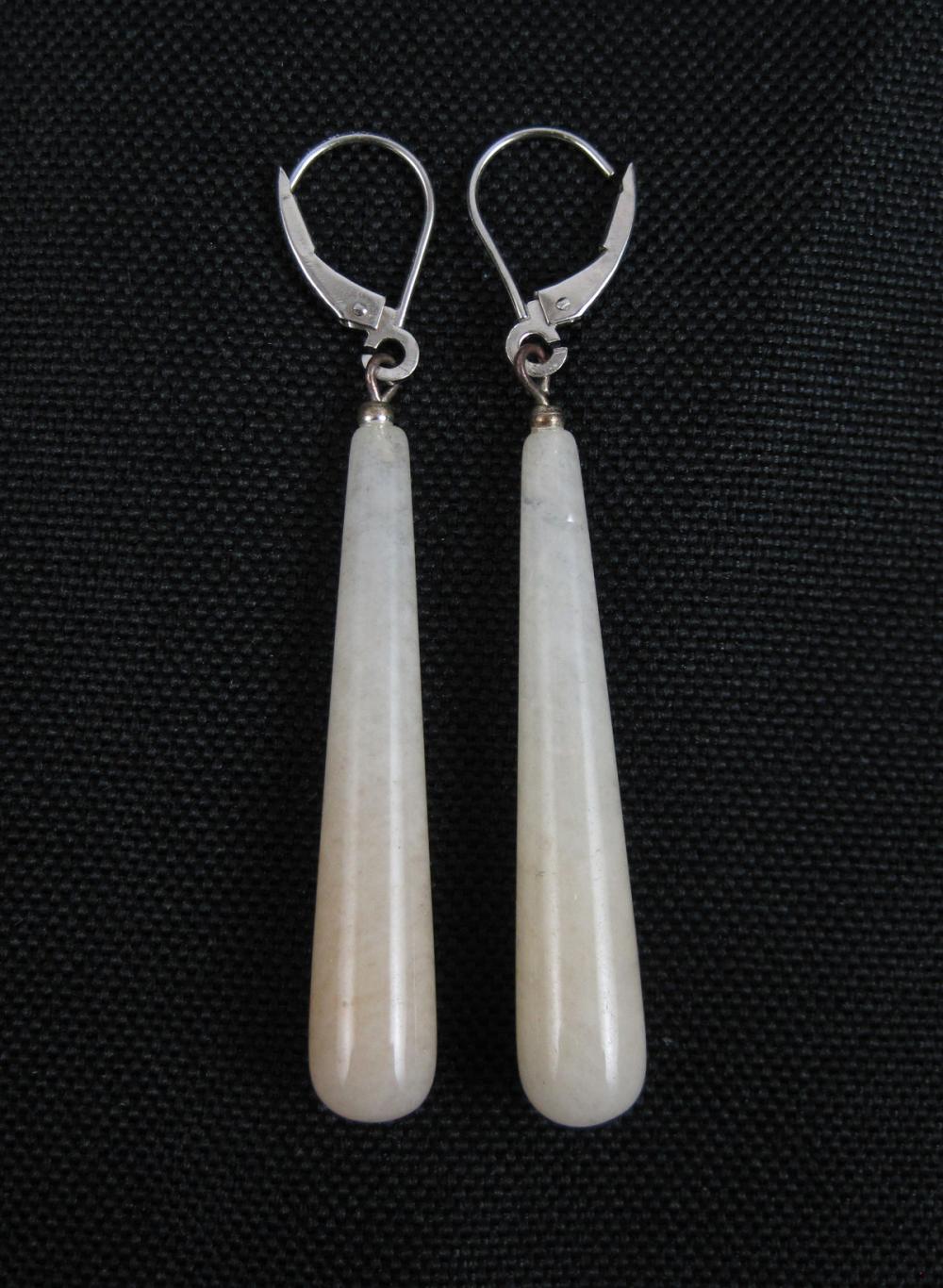 PAIR OF BUTTERMILK JADE AND WHITE