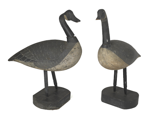 Pair of carved and painted Canada