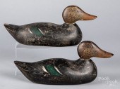 PAIR OF CARVED AND PAINTED MAL