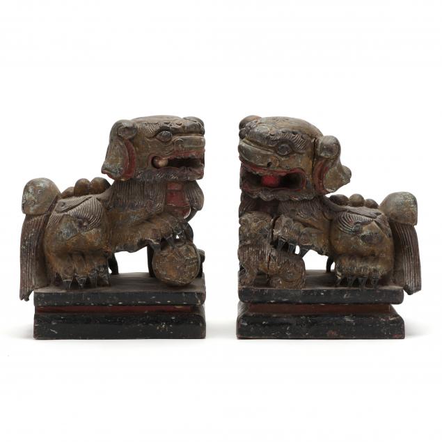 PAIR OF CARVED AND PAINTED WOOD FOO
