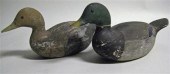 Pair of carved and painted mal