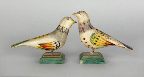 Pair of carved and vibrantly