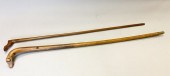 PAIR OF CARVED FOLK ART CANESF