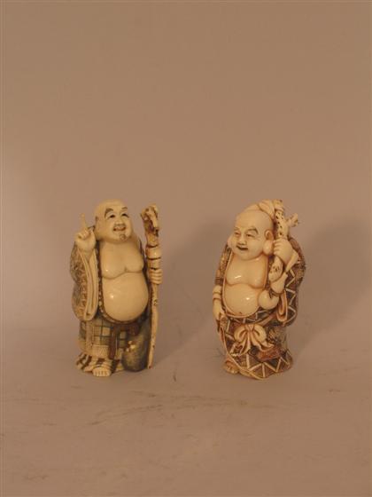 Pair of Carved Ivory Buddhas   