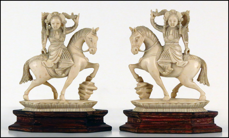 PAIR OF CARVED IVORY FIGURES OF