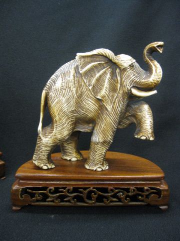 Pair of Carved Ivory Figurines of